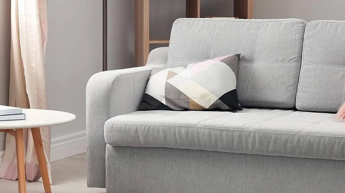 Light gray upholstered sofa with a throw pillow enhances your home’s interior for big impact.