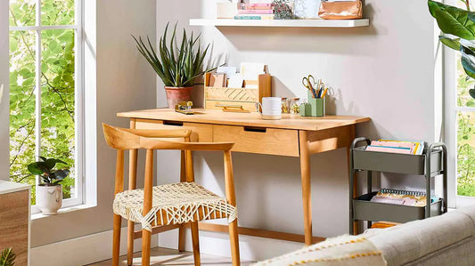 Mid-century modern wooden desk with drawer, ideal for lighting design in interior spaces.